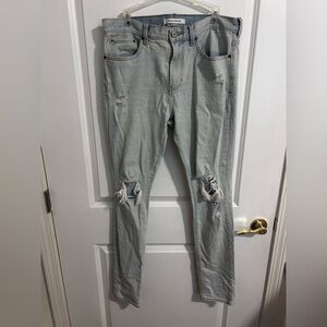 Distressed Men’s Relaxed Skinny Jeans